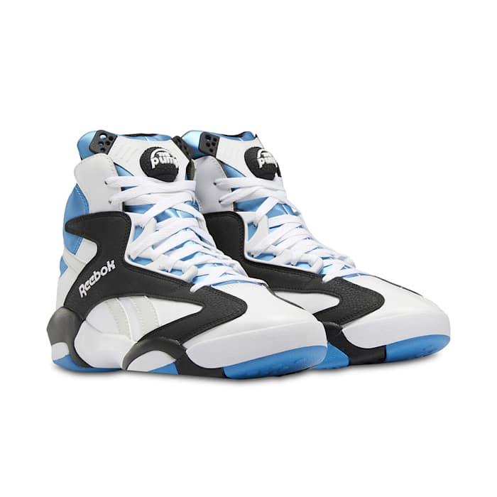 White, black, and blue Shaq Attaq shoes.